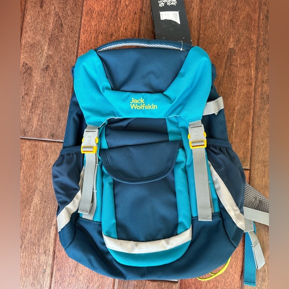 tumi alpha 3 backpack Brief Pack® Shimano Baitcasting resistant pocket for a Garcia Vengeance Abu Garcia Color:Navy Tan